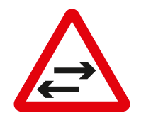 Two-way traffic crosses one-way road